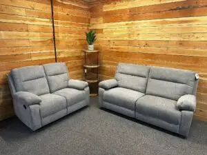 The Freya Sofa range / Collection In Light Grey Fabric Manual Recliners