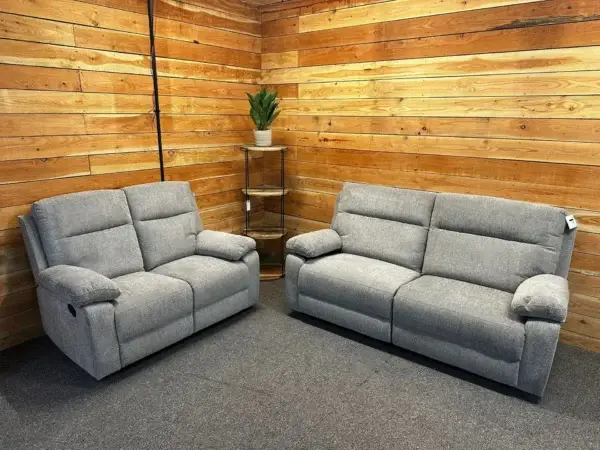 The Freya Sofa range / Collection In Light Grey Fabric Manual Recliners